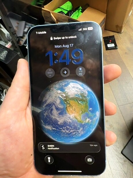 iPhone 14 Plus illuminated display after service