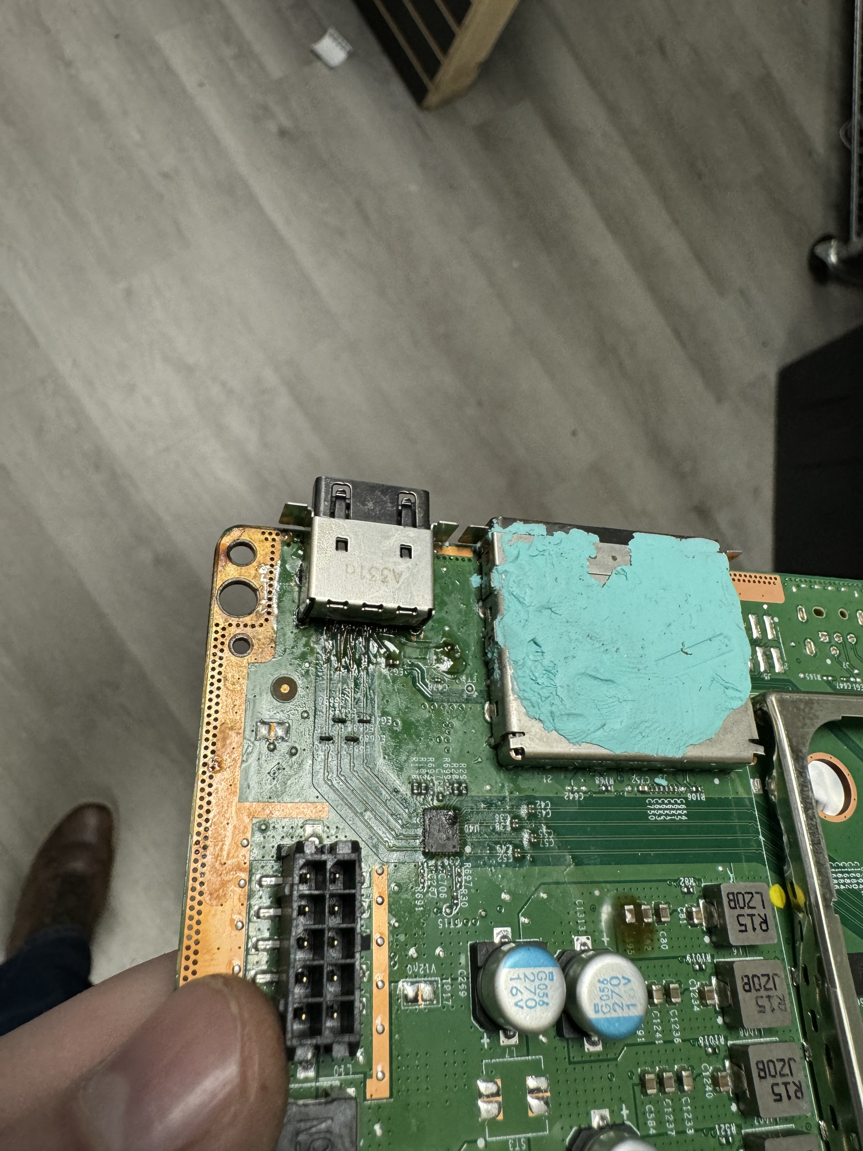 A completed Xbox Series X HDMI port rebuild with the new port seated and secured
