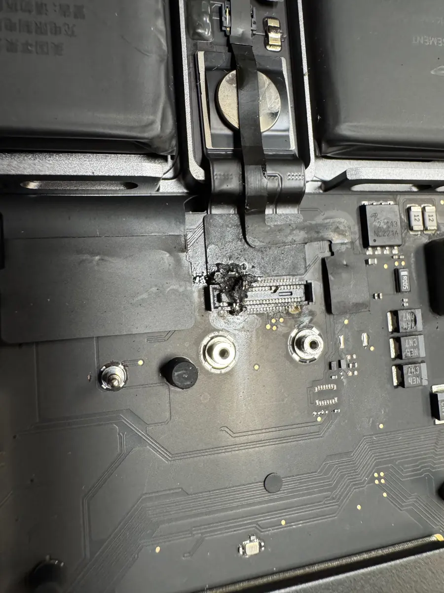 MacBook connector burnt by liquid